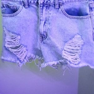 light washed shorts with rips